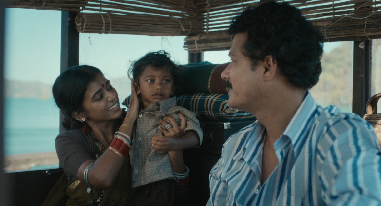 Karuna, a woman from the village, marries Narsing Rao, a wealthy townsperson with whom she has a child